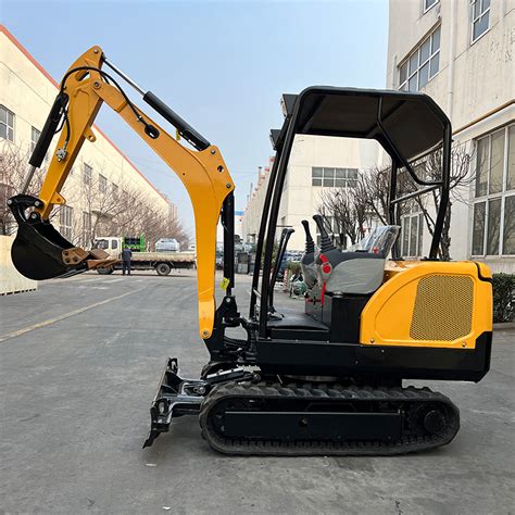 how steep of a hill can a mini excavator climb|mini excavators climbing steep.